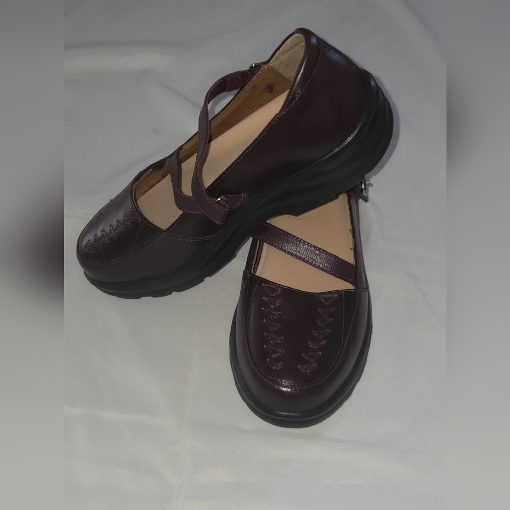 Classic Black Leather Flats with Strap and Rounded Toe